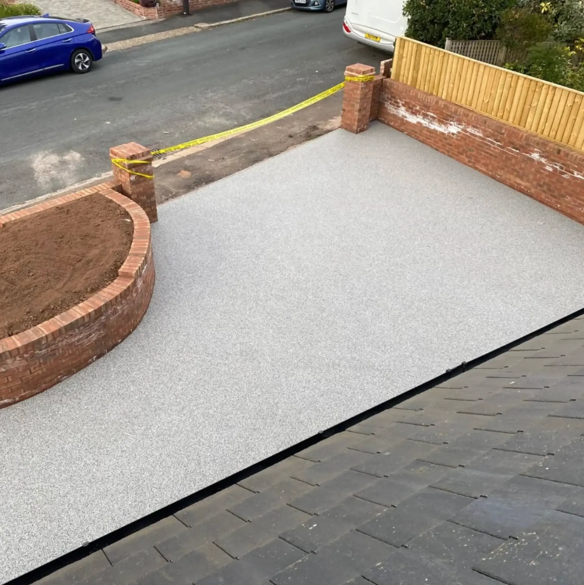 Finished resin-bound driveway with brick edging, Exmouth
