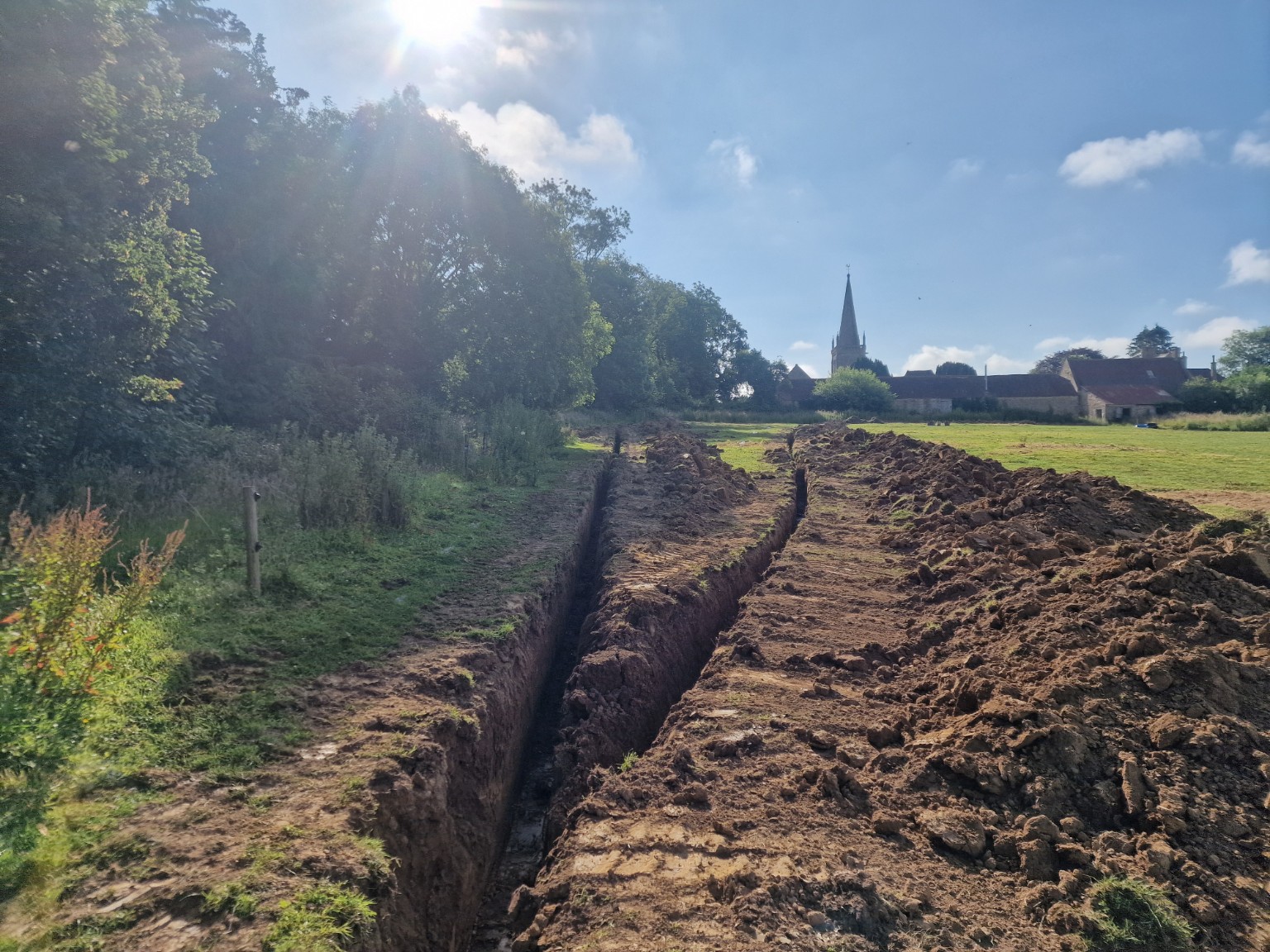 Long open utility trench